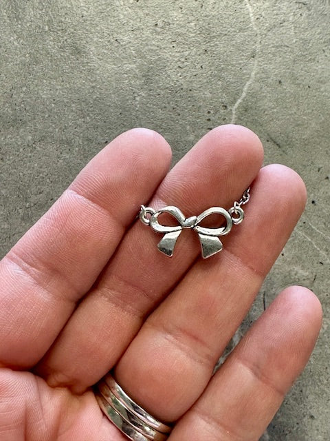 Small Silver Bow Charm Necklace